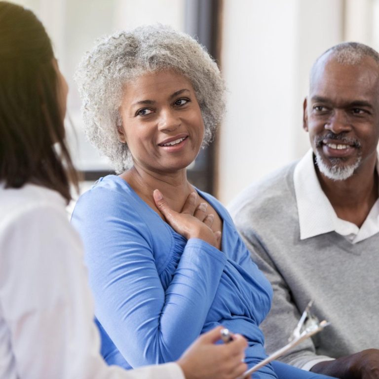 Senior couple receive good news from doctor