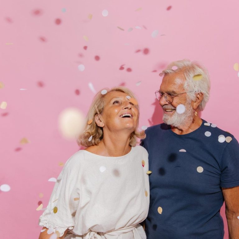 Smiling senior couple celebrates their anniversary