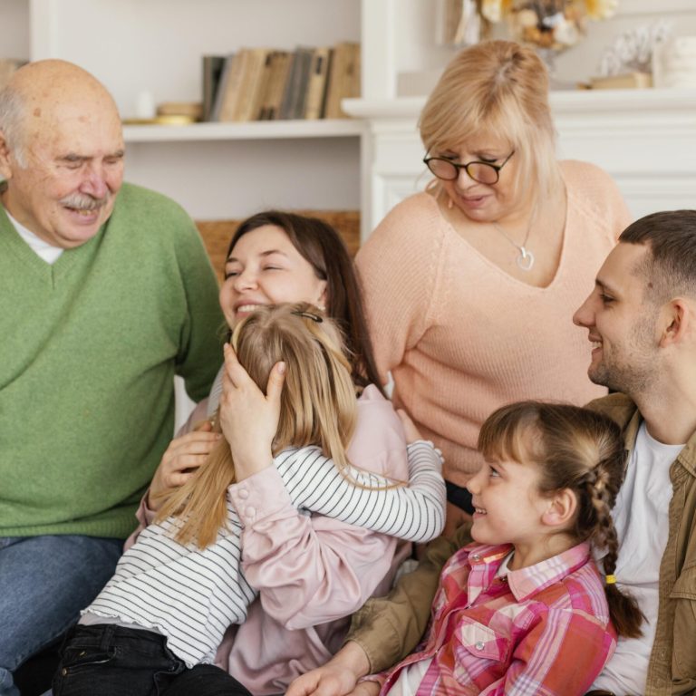 medium-shot-happy-family-couch